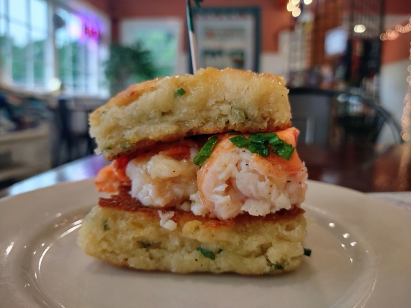 Lobster meat on a homemade cheddar chive biscuit